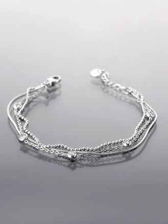 Elegantní trojitý náramek z chirurgické oceli s krystaly